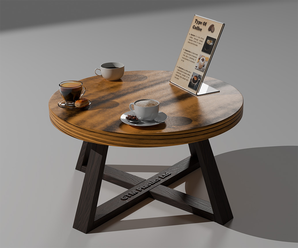A sloping acrylic poster holder sitting on a round wooden coffee table with three drinks spaced out. The poster is advertising three different coffee drinks.