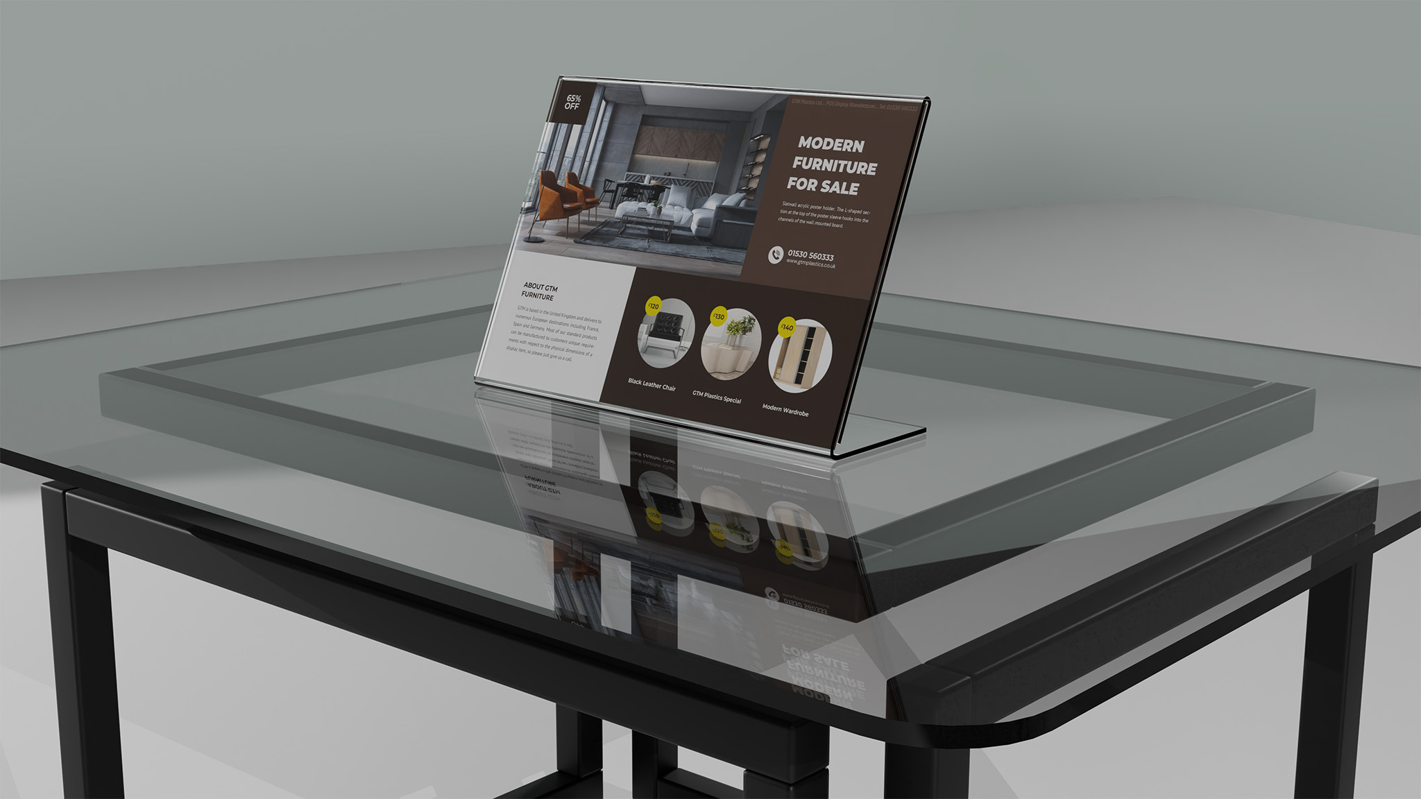 A sloping acrylic poster holder sitting on a glass top, metal frame dining table. The poster is advertising modern furniture for sale.