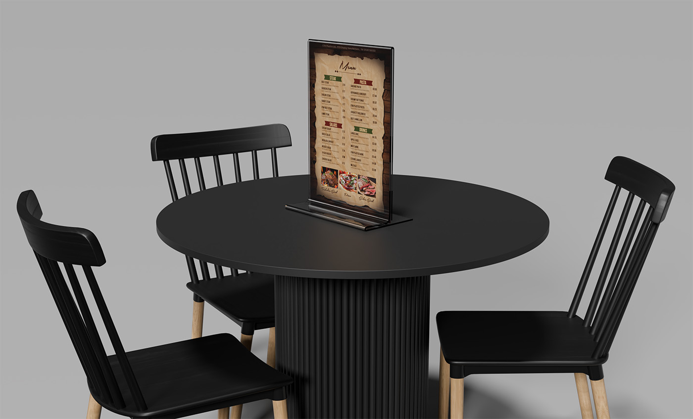 A free-standing upright acrylic poster holder placed on a round black table which has three chairs. The poster is advertising steak, pasta, salads, and drinks.